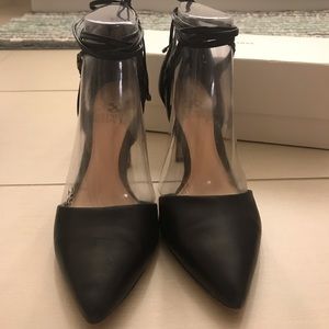 Black closed-toe leather ankle wrap heel